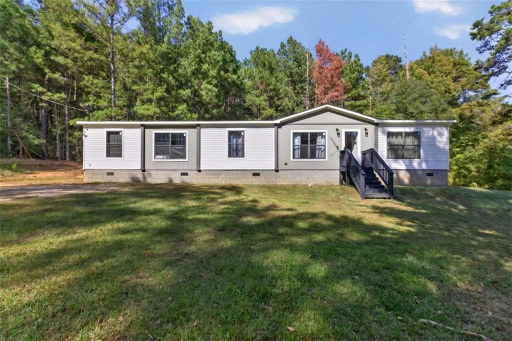 4 bedroom, 2 bathroom, 2,100 sq ft single family residence for sale at 86 Shadow Lake Road, Carrollton, GA 30116
