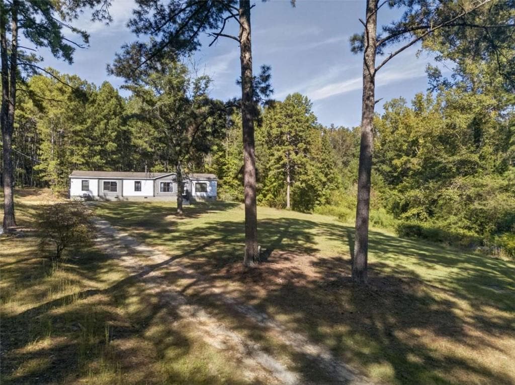 4 bedroom, 2 bathroom, 2,100 sq ft single family residence for sale at 86 Shadow Lake Road, Carrollton, GA 30116 — photo 3