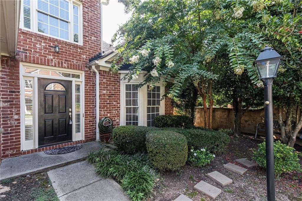 4 bedroom, 3 bathroom, 2,490 sq ft single family residence for sale at 4169 Regency Court, Brookhaven, GA 30341 — photo 2