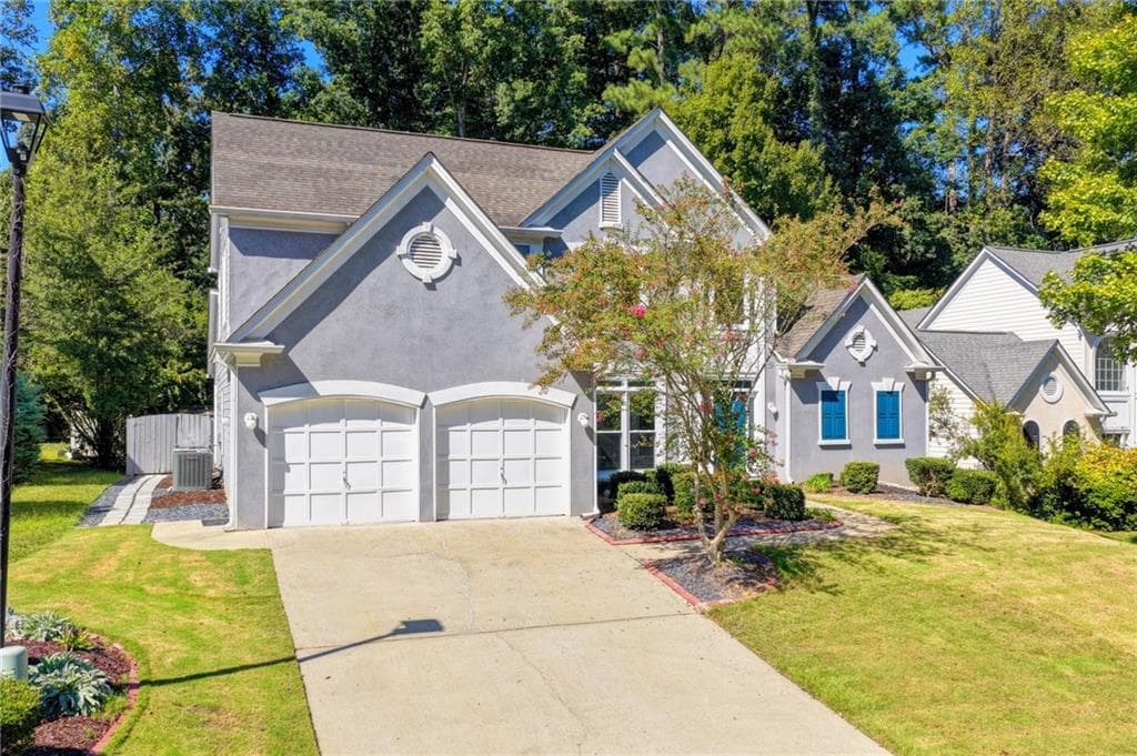 4 bedroom, 3 bathroom, 3,109 sq ft single family residence for sale at 5005 Avala Park Lane, Peachtree Corners, GA 30092 — photo 2