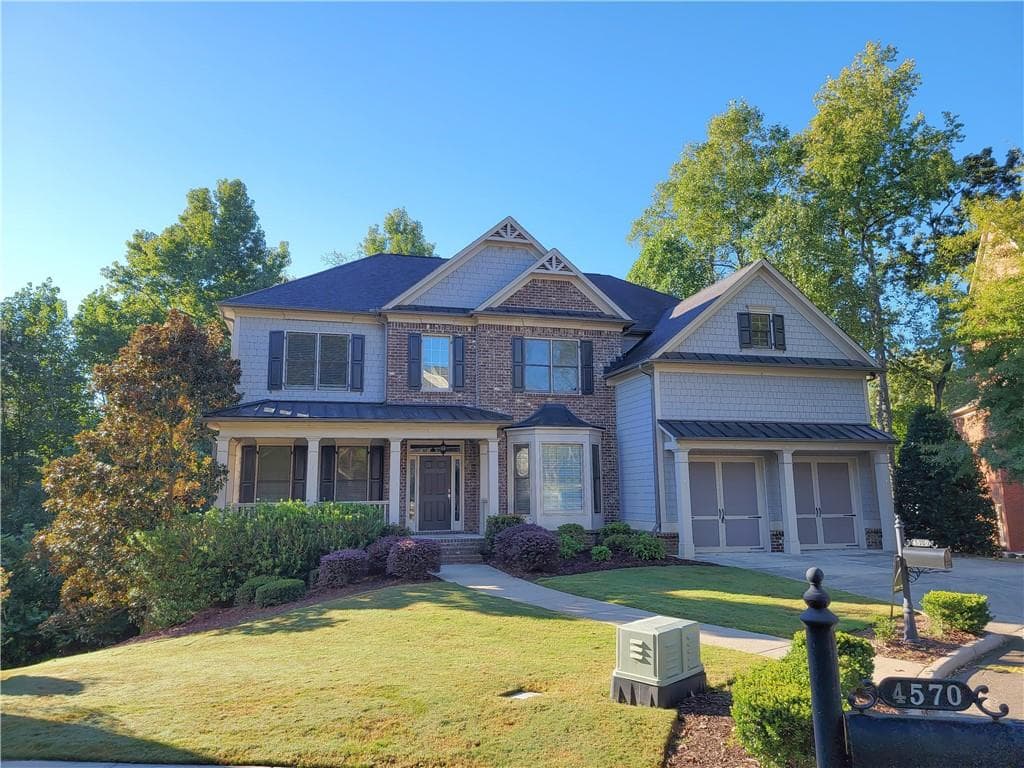 5 bedroom, 4 bathroom, 4,852 sq ft single family residence for sale at 4560 Upland Court, Cumming, GA 30040
