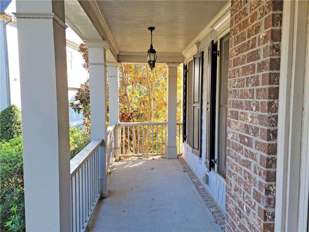 5 bedroom, 4 bathroom, 4,852 sq ft single family residence for sale at 4560 Upland Court, Cumming, GA 30040 — photo 2