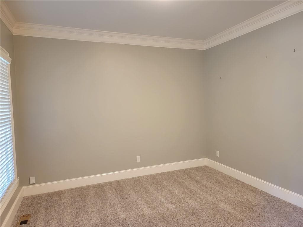 5 bedroom, 4 bathroom, 4,852 sq ft single family residence for sale at 4560 Upland Court, Cumming, GA 30040 — photo 5