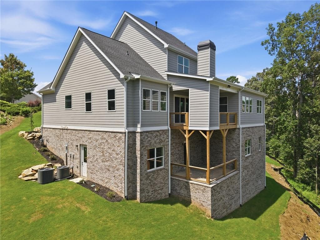 5 bedroom, 4 bathroom, 3,252 sq ft single family residence for sale at 7381 Lazy Hammock Way, Flowery Branch, GA 30542 — photo 5