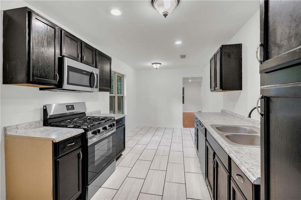 3 bedroom, 2 bathroom, 1,276 sq ft single family residence for sale at 3690 Asbury Lane, Atlanta, GA 30331 — photo 9