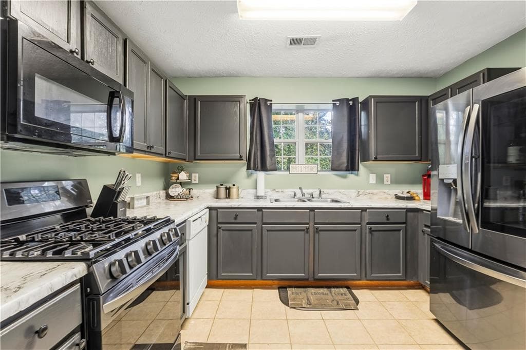 3 bedroom, 2 bathroom, 1,472 sq ft single family residence for sale at 2228 Asquith Avenue, Marietta, GA 30008 — photo 5
