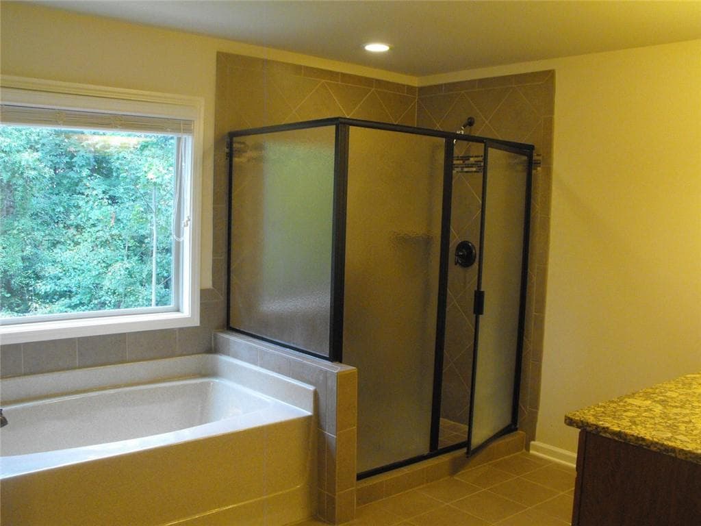 7 bedroom, 5 bathroom, 4,716 sq ft single family residence for sale at 4289 Amberleaf Walk, Lilburn, GA 30047 — photo 4