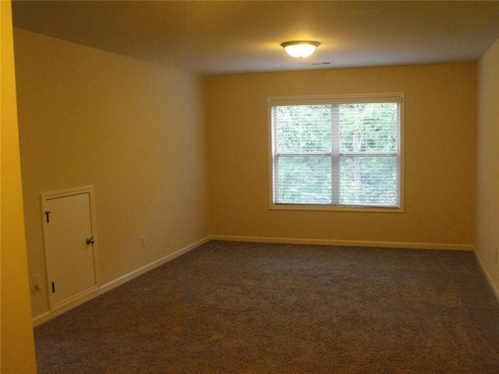 7 bedroom, 5 bathroom, 4,716 sq ft single family residence for sale at 4289 Amberleaf Walk, Lilburn, GA 30047 — photo 9