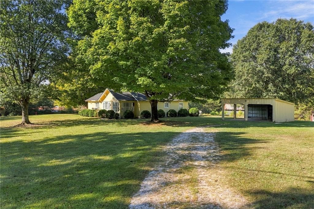 3 bedroom, 1 bathroom, 1,396 sq ft single family residence for sale at 238 Henry Turner Trail, Ball Ground, GA 30107 — photo 2