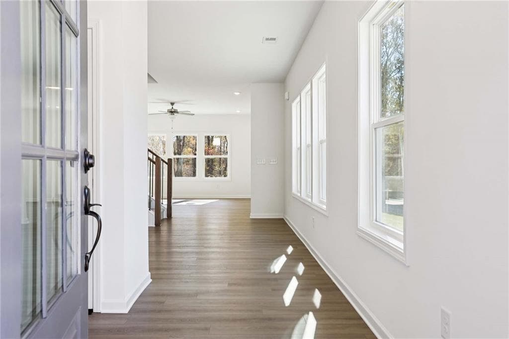 5 bedroom, 4 bathroom, 3,358 sq ft single family residence for sale at 6234 Kismet Road, Buford, GA 30518 — photo 2