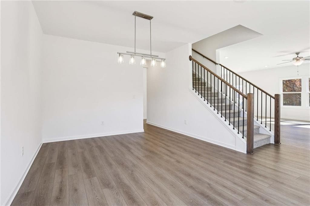 5 bedroom, 4 bathroom, 3,358 sq ft single family residence for sale at 6234 Kismet Road, Buford, GA 30518 — photo 3