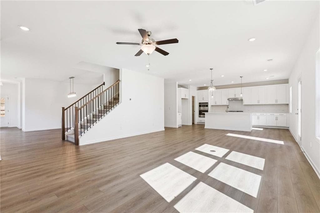 5 bedroom, 4 bathroom, 3,358 sq ft single family residence for sale at 6234 Kismet Road, Buford, GA 30518 — photo 5