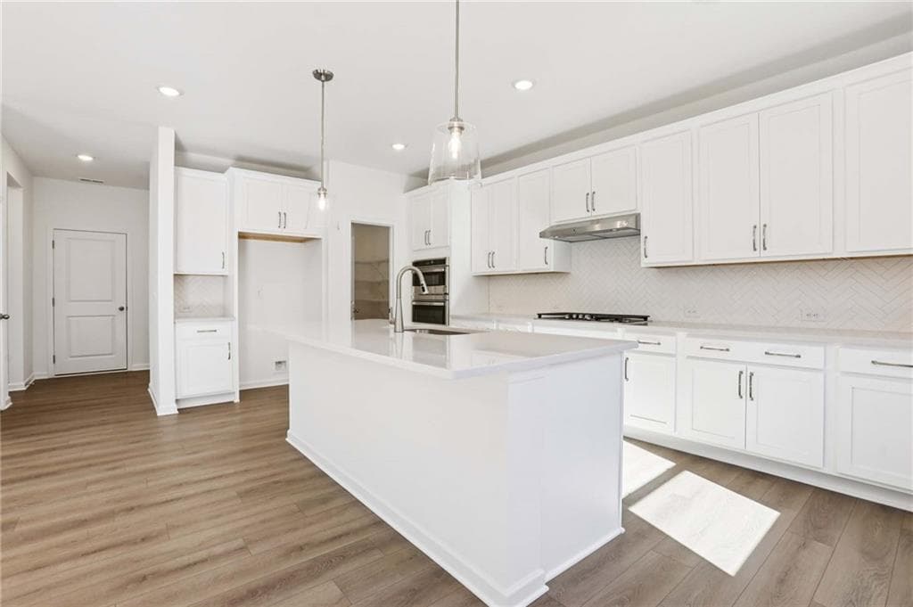 5 bedroom, 4 bathroom, 3,358 sq ft single family residence for sale at 6234 Kismet Road, Buford, GA 30518 — photo 9