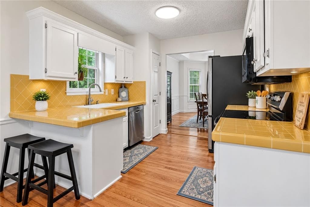 4 bedroom, 3 bathroom, 2,098 sq ft single family residence for sale at 4155 Gables Place, Buford, GA 30519 — photo 8