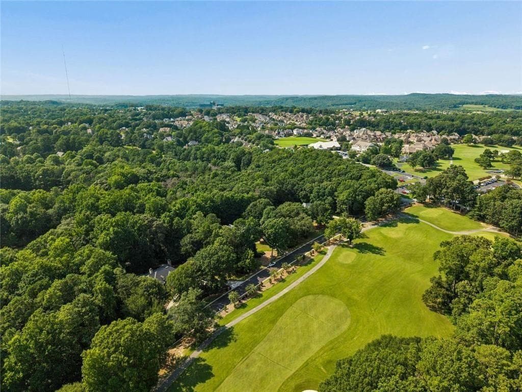 5 bedroom, 4 bathroom, 5,632 sq ft single family residence for sale at 5720 Golf Club Drive, Braselton, GA 30517 — photo 4