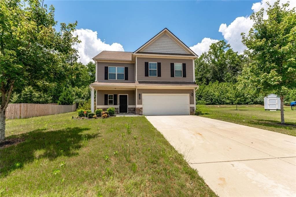 4 bedroom, 3 bathroom, 2,268 sq ft single family residence for sale at 1435 Beckett Drive, Hampton, GA 30228 — photo 2