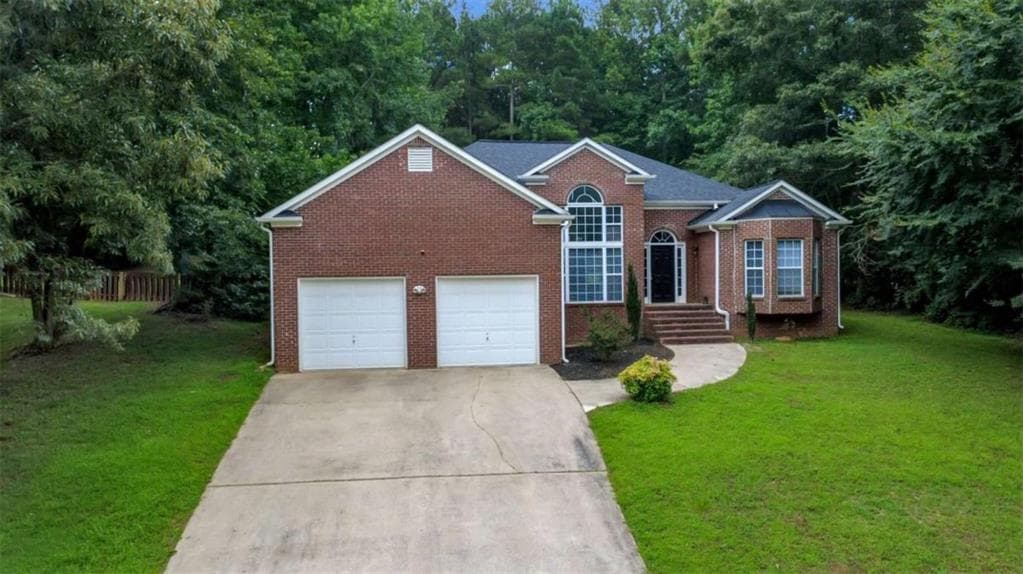 4 bedroom, 2 bathroom, 2,105 sq ft single family residence for sale at 2698 Old Stagecoach Way, Douglasville, GA 30135