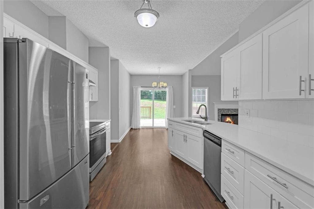 4 bedroom, 2 bathroom, 2,105 sq ft single family residence for sale at 2698 Old Stagecoach Way, Douglasville, GA 30135 — photo 6