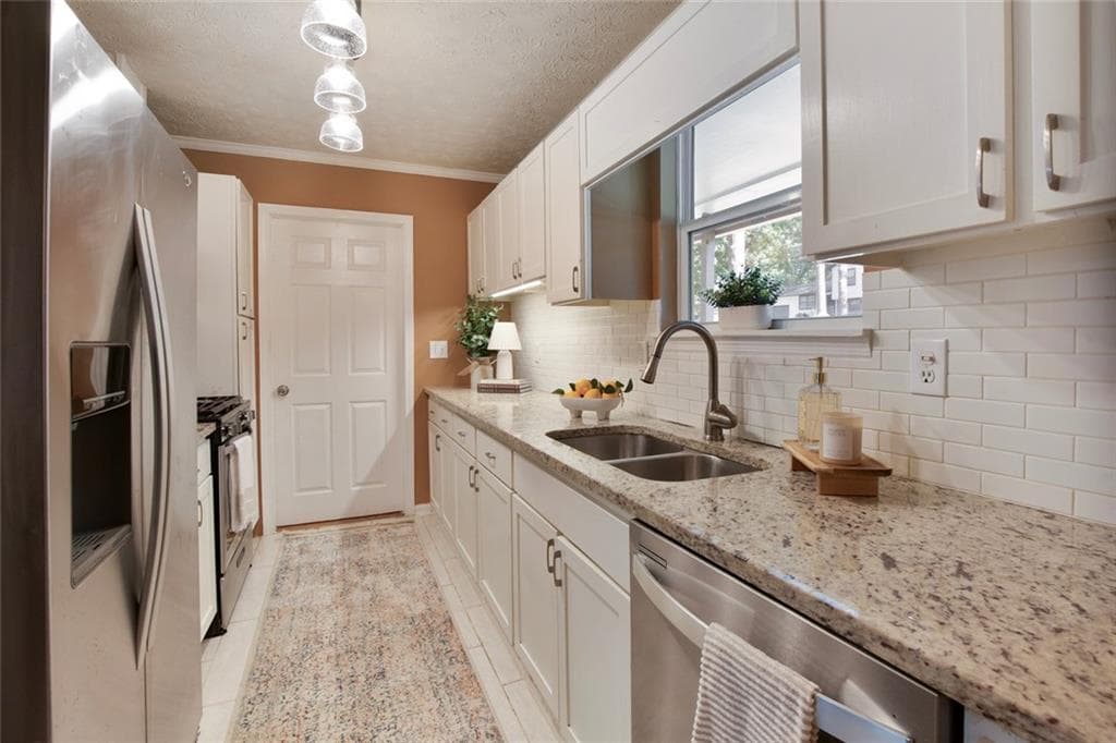 3 bedroom, 2 bathroom, 1,272 sq ft single family residence for sale at 2494 Rhoanoke Drive, Duluth, GA 30096 — photo 3