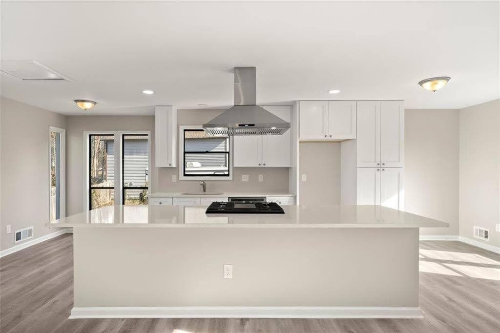 4 bedroom, 3 bathroom, 2,340 sq ft single family residence for sale at 2673 Deerfield Circle, Marietta, GA 30064 — photo 2