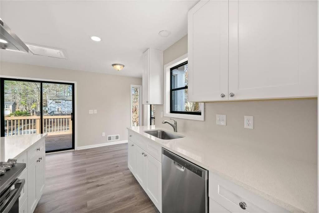4 bedroom, 3 bathroom, 2,340 sq ft single family residence for sale at 2673 Deerfield Circle, Marietta, GA 30064 — photo 6