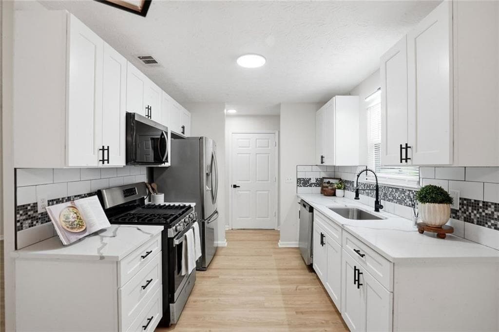 3 bedroom, 2 bathroom, 1,676 sq ft single family residence for sale at 6839 Silver Maple Drive, Rex, GA 30273 — photo 8