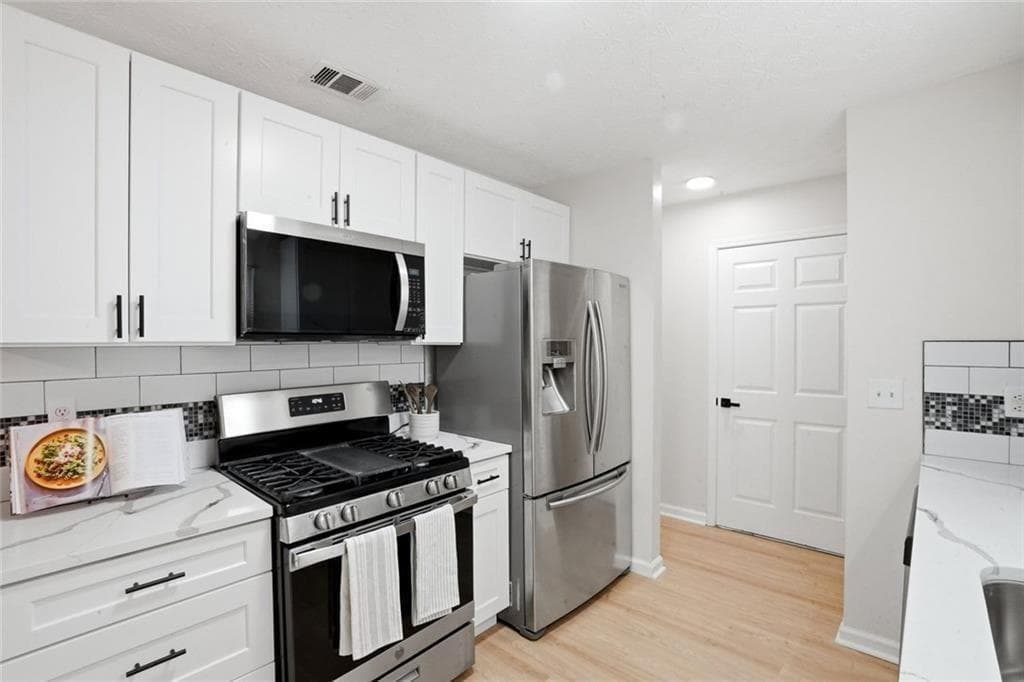 3 bedroom, 2 bathroom, 1,676 sq ft single family residence for sale at 6839 Silver Maple Drive, Rex, GA 30273 — photo 9