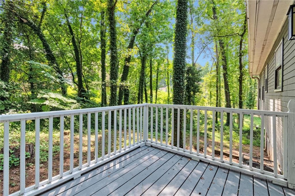 6 bedroom, 3 bathroom, 2,734 sq ft single family residence for sale at 5322 Scarbrough Round, Stone Mountain, GA 30088 — photo 2