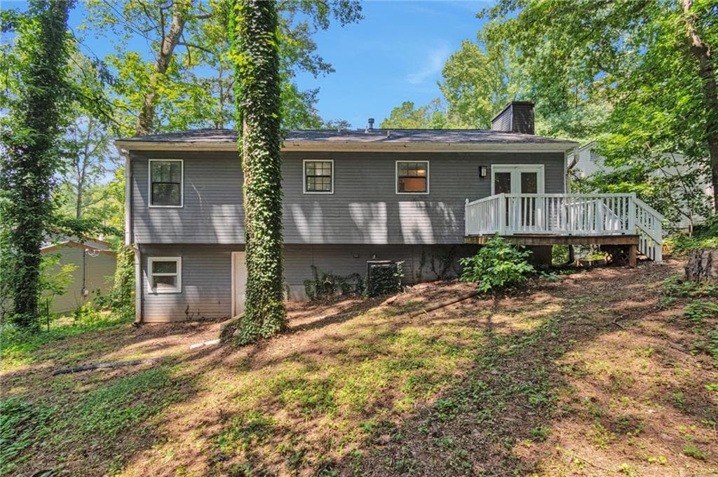6 bedroom, 3 bathroom, 2,734 sq ft single family residence for sale at 5322 Scarbrough Round, Stone Mountain, GA 30088 — photo 3
