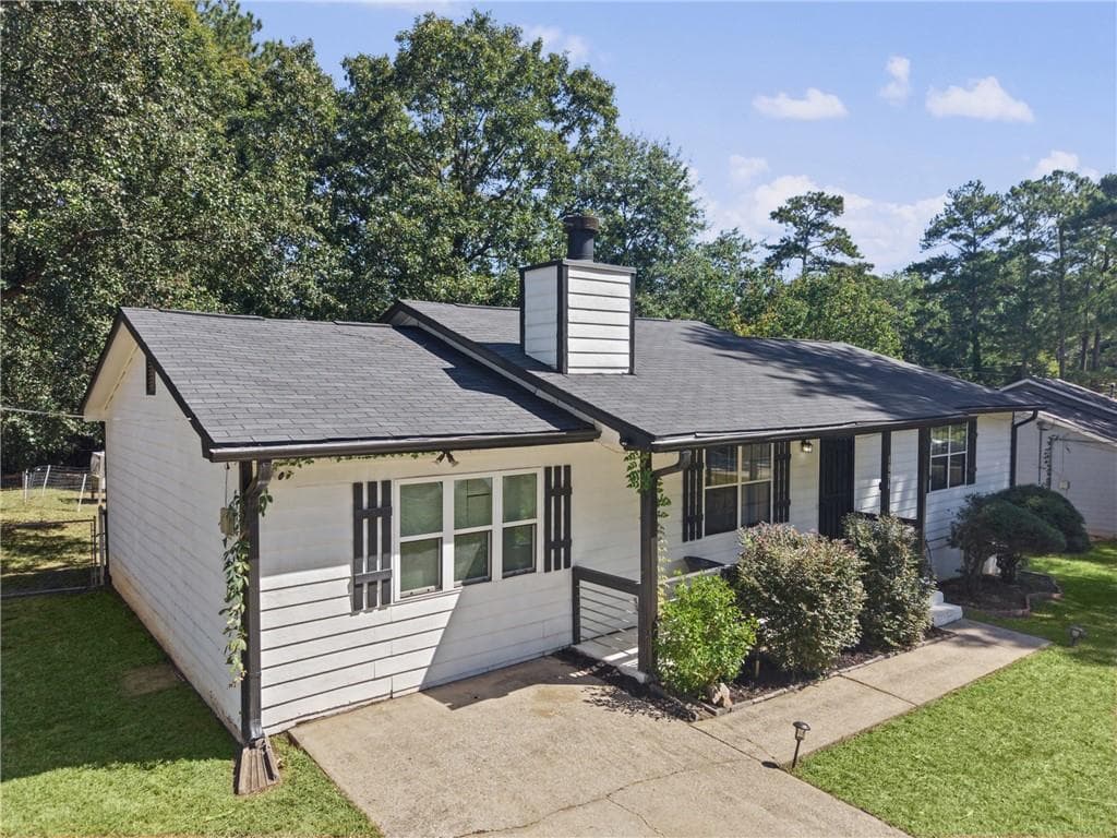 4 bedroom, 2 bathroom, 1,176 sq ft single family residence for sale at 1096 Greendale Lane, Jonesboro, GA 30238 — photo 3