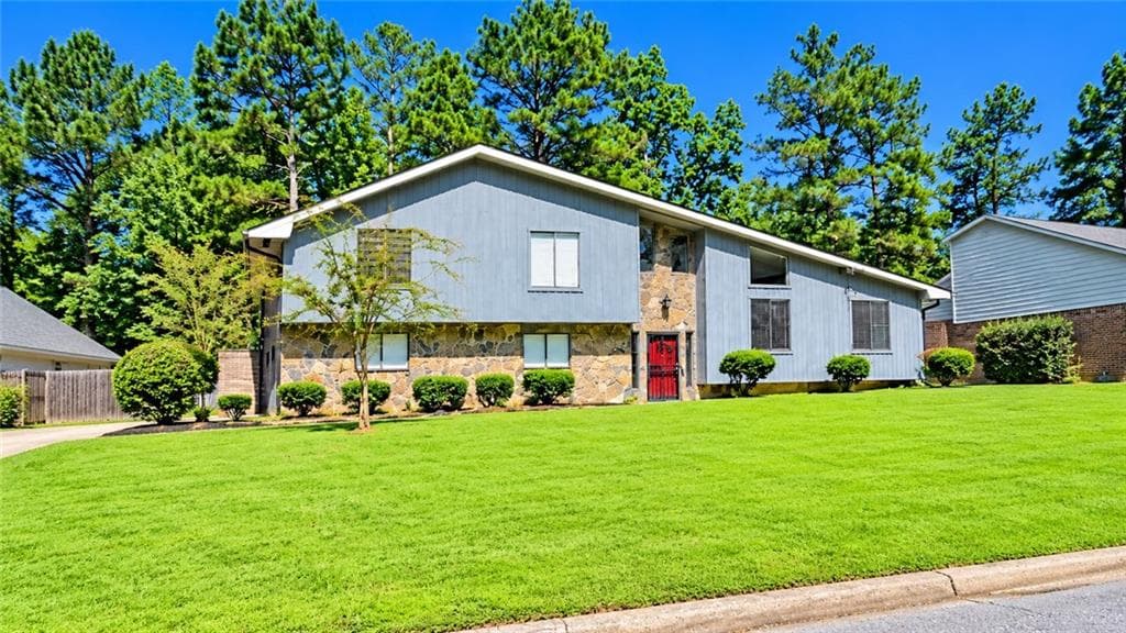 4 bedroom, 3 bathroom, 1,600 sq ft single family residence for sale at 3255 Redona Drive, Atlanta, GA 30349
