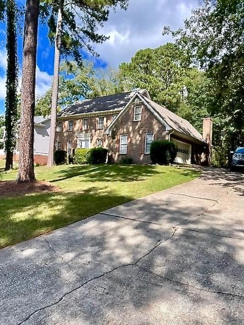 4 bedroom, 3 bathroom, 3,074 sq ft single family residence for sale at 5160 Shadow Path Lane, Lilburn, GA 30047 — photo 3