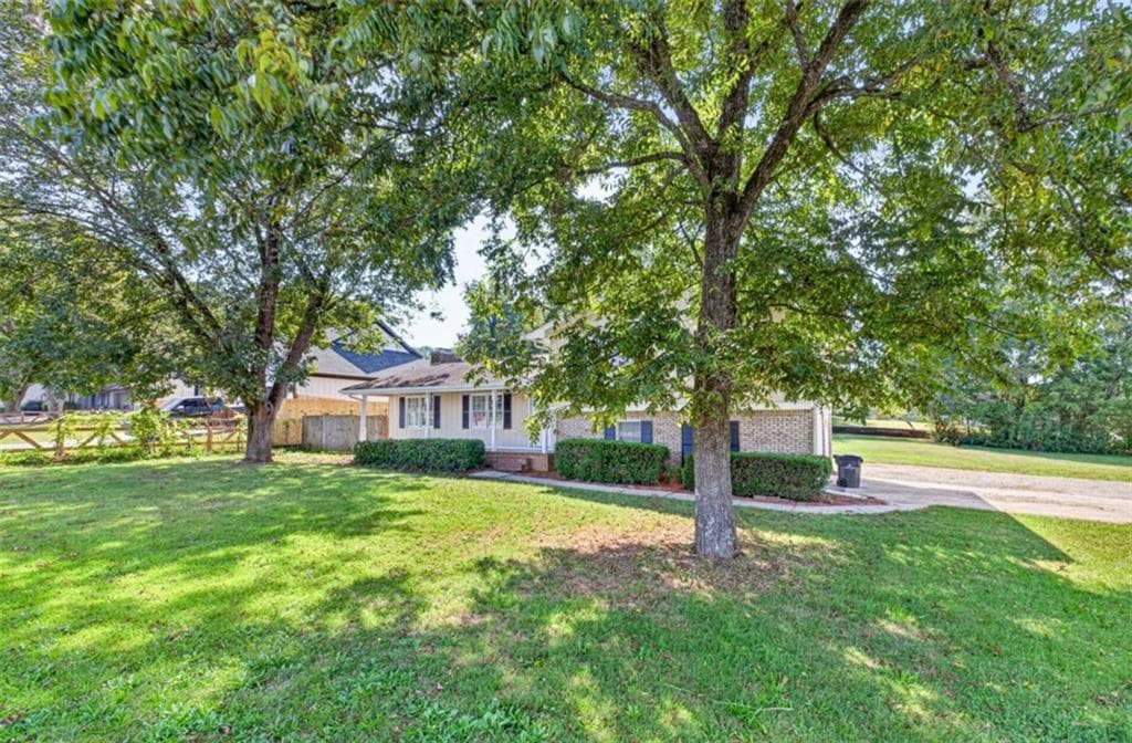 3 bedroom, 2 bathroom, 1,438 sq ft single family residence for sale at 1021 GRAYSON Highway, Lawrenceville, GA 30046 — photo 2