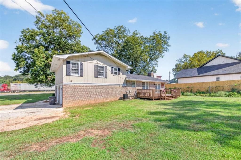 3 bedroom, 2 bathroom, 1,438 sq ft single family residence for sale at 1021 GRAYSON Highway, Lawrenceville, GA 30046 — photo 5