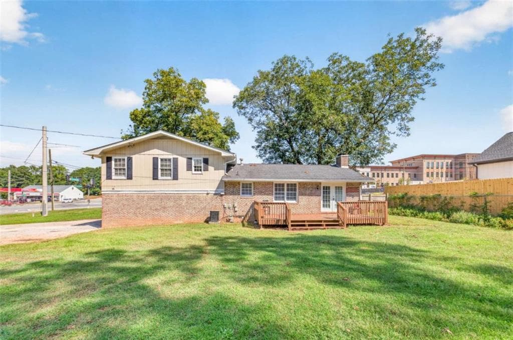 3 bedroom, 2 bathroom, 1,438 sq ft single family residence for sale at 1021 GRAYSON Highway, Lawrenceville, GA 30046 — photo 6