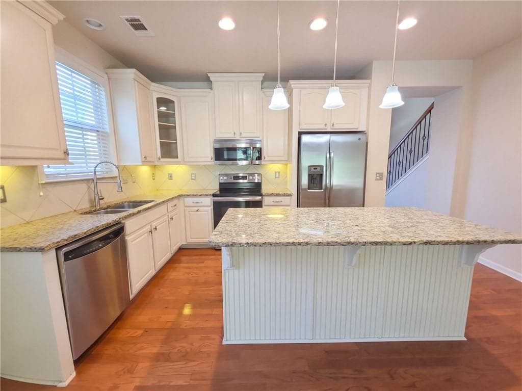 3 bedroom, 3 bathroom, 2,368 sq ft single family residence for sale at 3955 Village Estates Court, Cumming, GA 30040 — photo 2