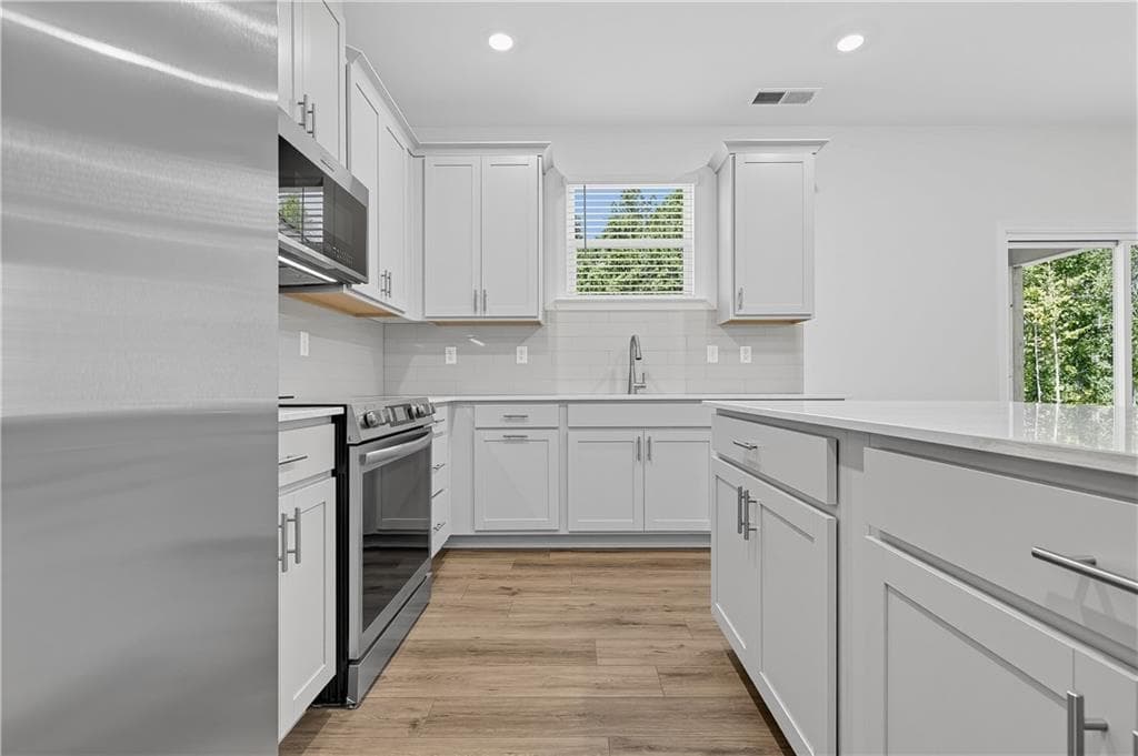 5 bedroom, 4 bathroom, 2,220 sq ft single family residence for sale at 446 Panther Creek Lane, Jackson, GA 30233 — photo 9