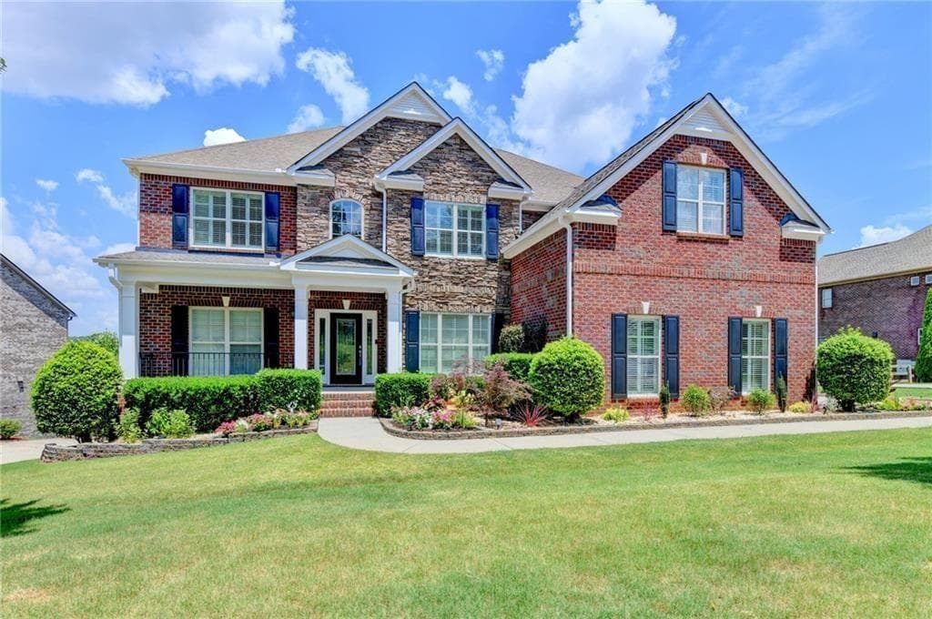 6 bedroom, 5 bathroom, 6,377 sq ft home for sale at 2825 Waterstone Drive, Cumming, GA
