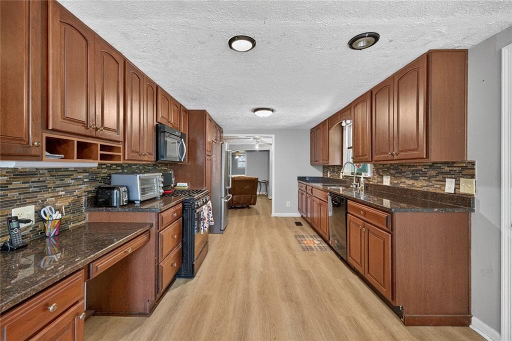 4 bedroom, 3 bathroom, 3,784 sq ft single family residence for sale at 3076 Thompson Mill Road, Buford, GA 30519 — photo 7