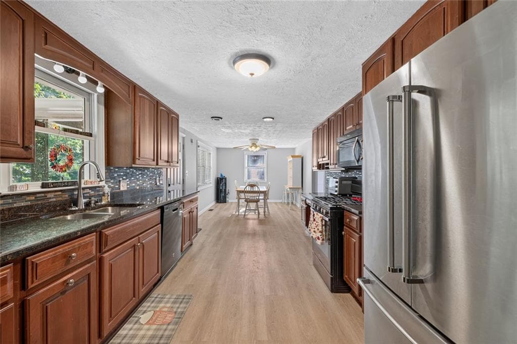 4 bedroom, 3 bathroom, 3,784 sq ft single family residence for sale at 3076 Thompson Mill Road, Buford, GA 30519 — photo 10