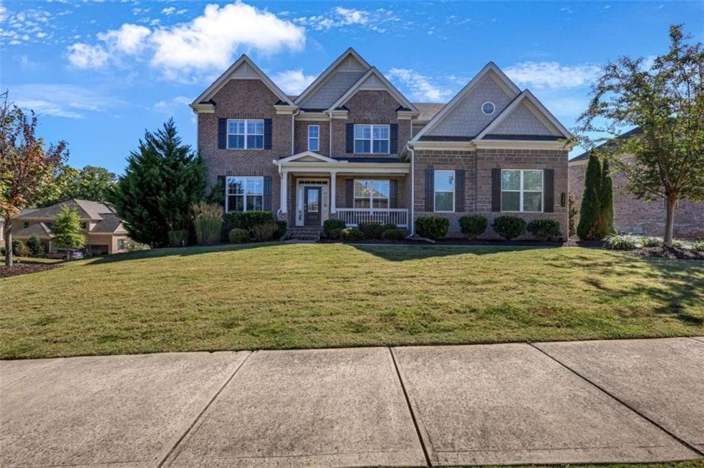 5 bedroom, 4 bathroom, 4,375 sq ft single family residence for sale at 5980 Roxboro Court, Cumming, GA 30040 — photo 2