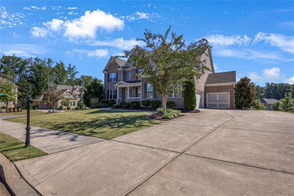 5 bedroom, 4 bathroom, 4,375 sq ft single family residence for sale at 5980 Roxboro Court, Cumming, GA 30040 — photo 3
