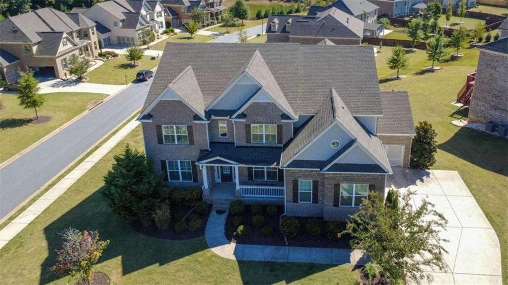 5 bedroom, 4 bathroom, 4,375 sq ft single family residence for sale at 5980 Roxboro Court, Cumming, GA 30040 — photo 5