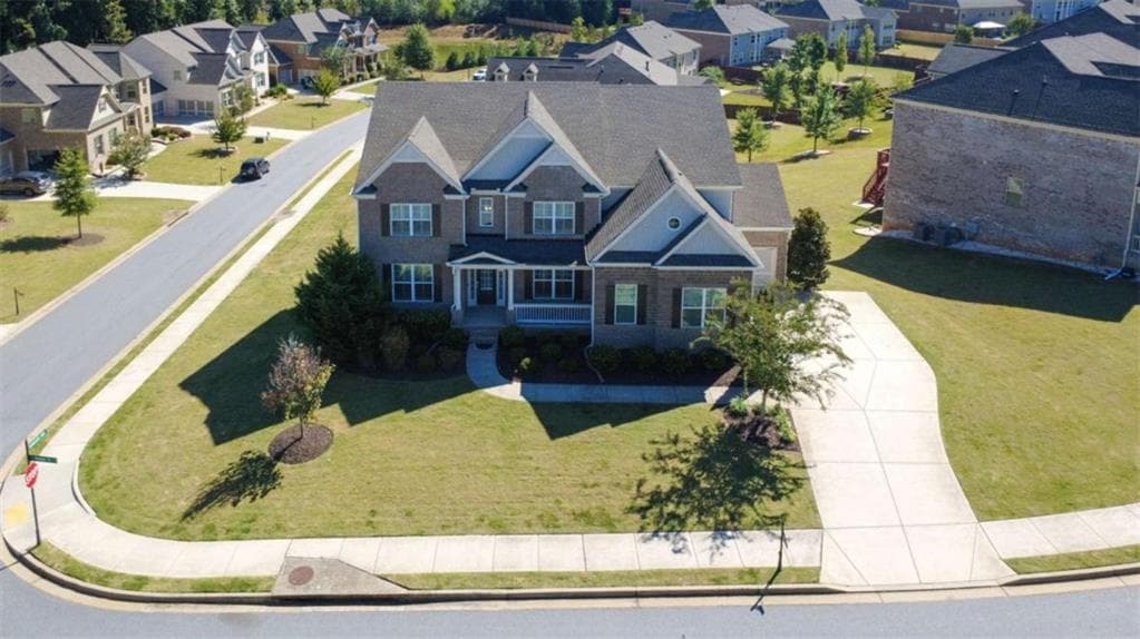 5 bedroom, 4 bathroom, 4,375 sq ft single family residence for sale at 5980 Roxboro Court, Cumming, GA 30040 — photo 6