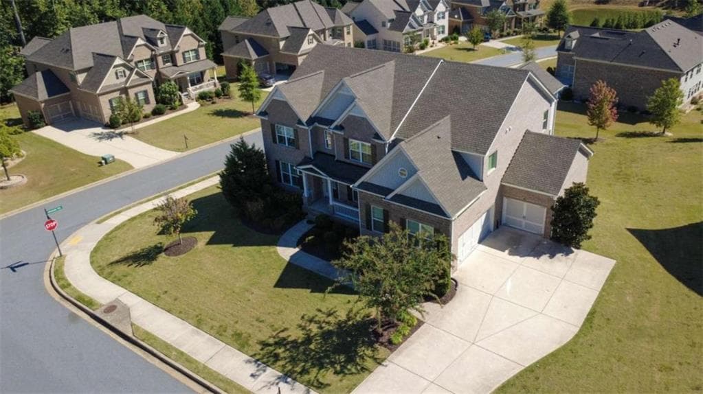 5 bedroom, 4 bathroom, 4,375 sq ft single family residence for sale at 5980 Roxboro Court, Cumming, GA 30040 — photo 7