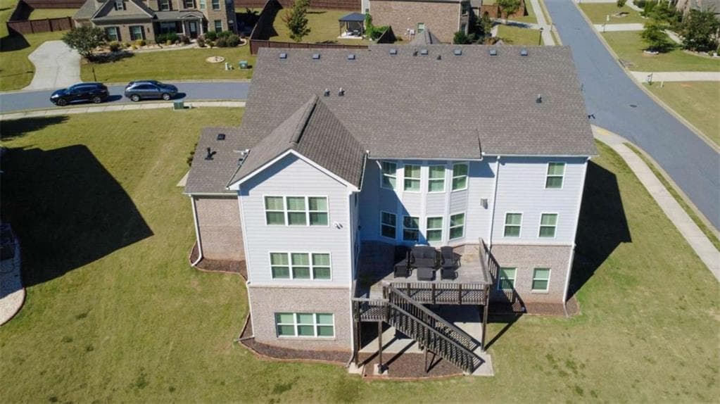 5 bedroom, 4 bathroom, 4,375 sq ft single family residence for sale at 5980 Roxboro Court, Cumming, GA 30040 — photo 8