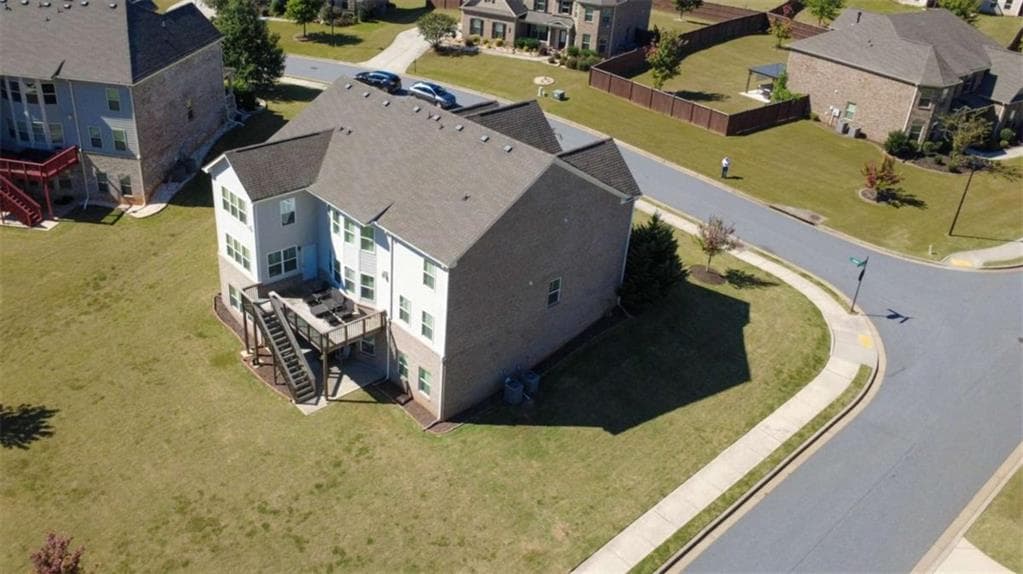 5 bedroom, 4 bathroom, 4,375 sq ft single family residence for sale at 5980 Roxboro Court, Cumming, GA 30040 — photo 9