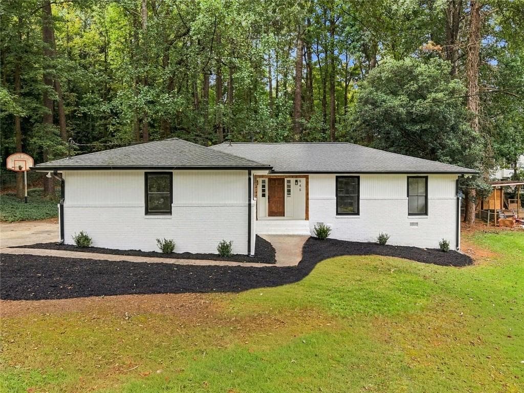 4 bedroom, 3 bathroom, 1,716 sq ft single family residence for sale at 645 Noell Way, Lilburn, GA 30047