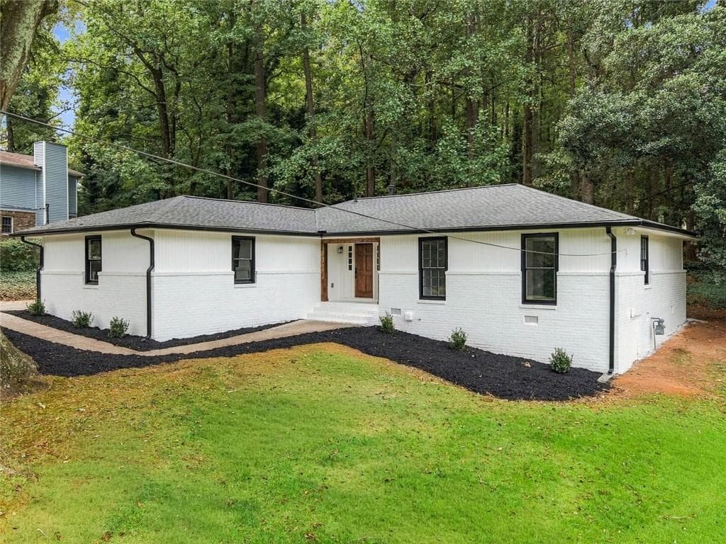 4 bedroom, 3 bathroom, 1,716 sq ft single family residence for sale at 645 Noell Way, Lilburn, GA 30047 — photo 2
