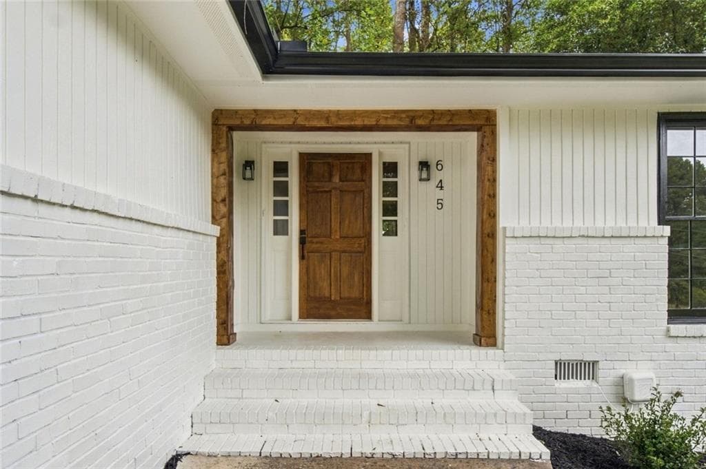 4 bedroom, 3 bathroom, 1,716 sq ft single family residence for sale at 645 Noell Way, Lilburn, GA 30047 — photo 3